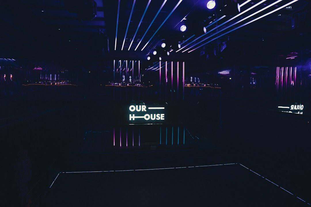 Live news broadcast set with anchors under studio lights